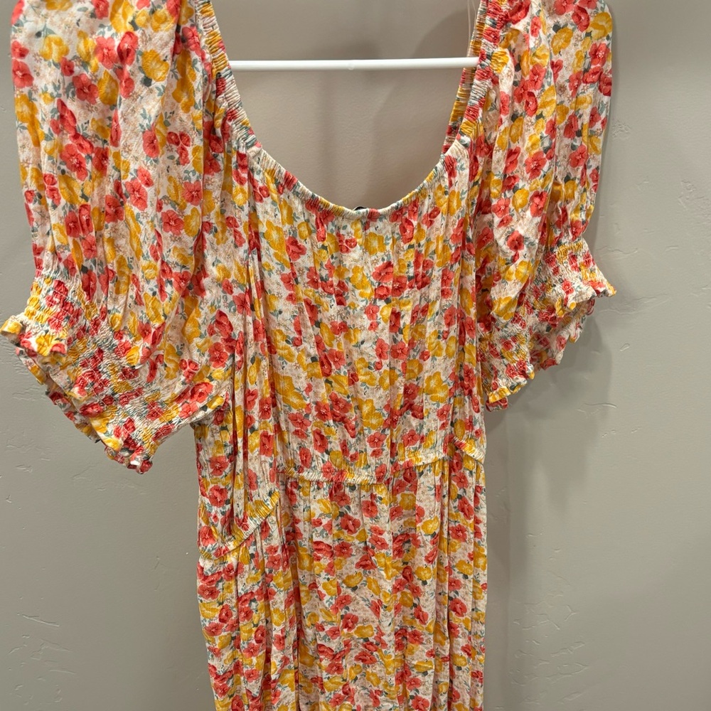 Floor length maternity dress.